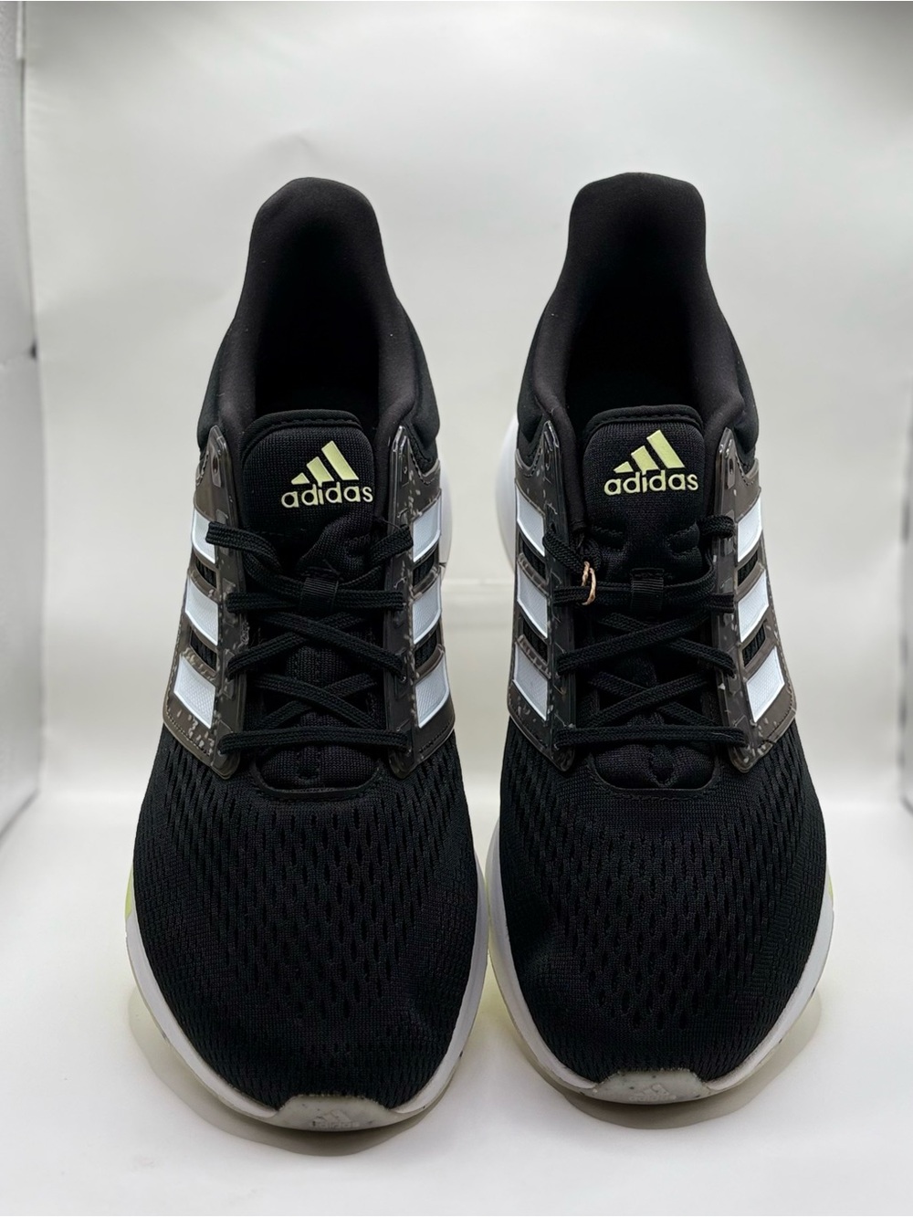 adidas Black Athletic Running Shoes with White Stripes